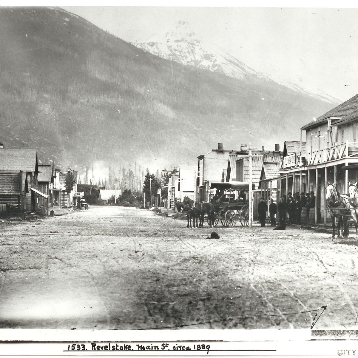 black and white images of front street in the old days