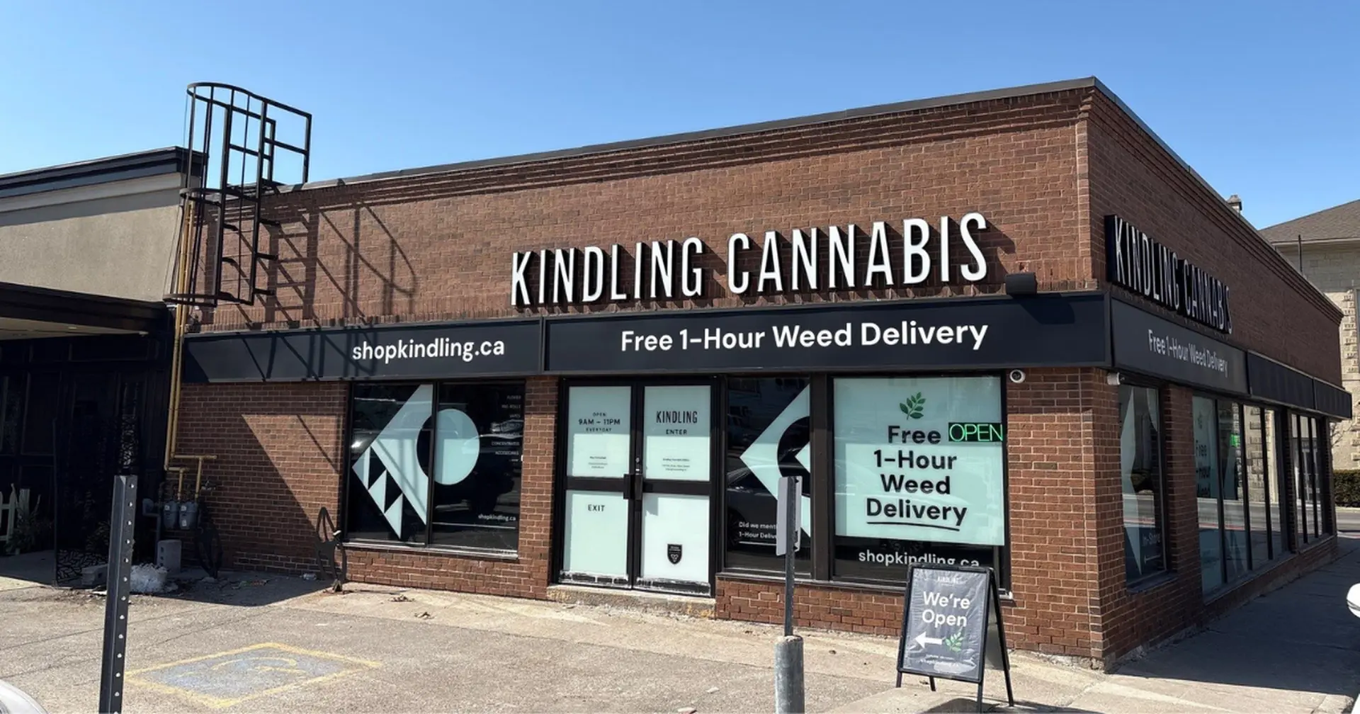 Street-facing door and sign of Kindling cannabis store on Mary Street, Milton