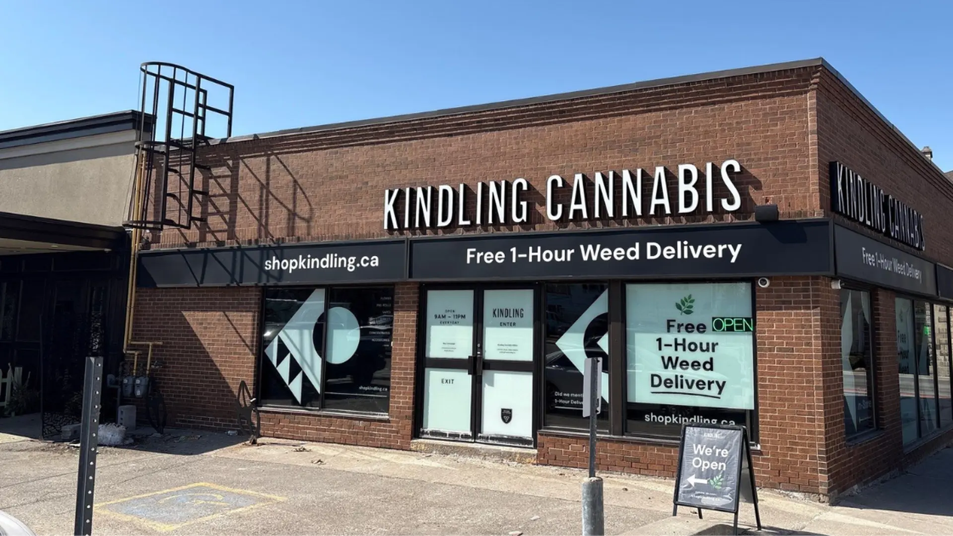 Street-facing door and sign of Kindling cannabis store on Mary Street, Milton