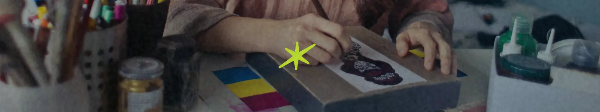 hands painting art markers crafting with kindling cannabis delivery dispensary logo mark