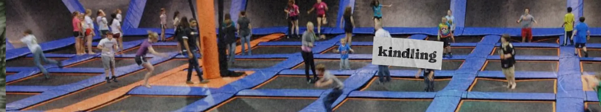 people on trampoline jumping indoor activity kindling cannabis delivery dispensary logo watermark