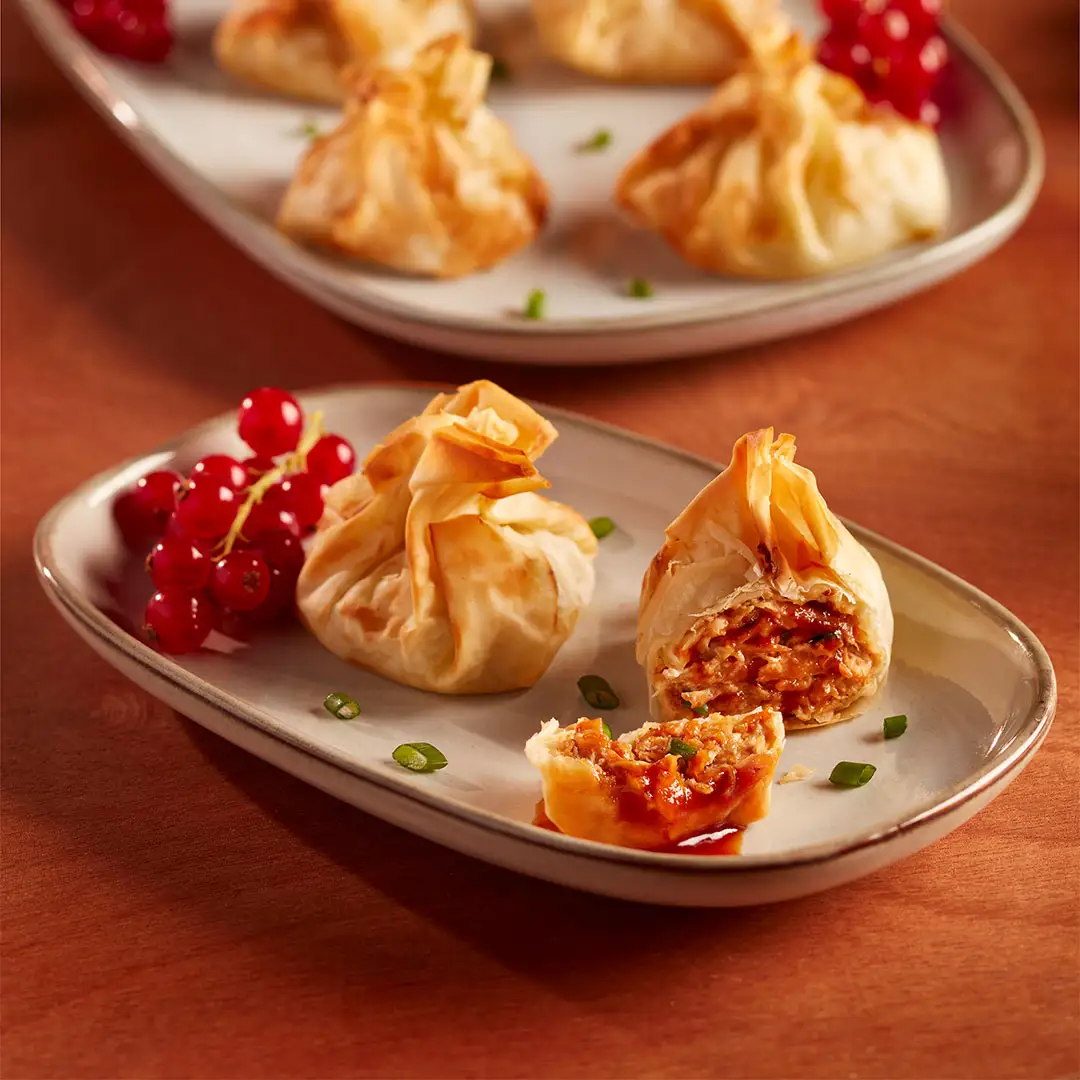 Baluchons feuilletés de côte de dos de porc et fromage à la crème