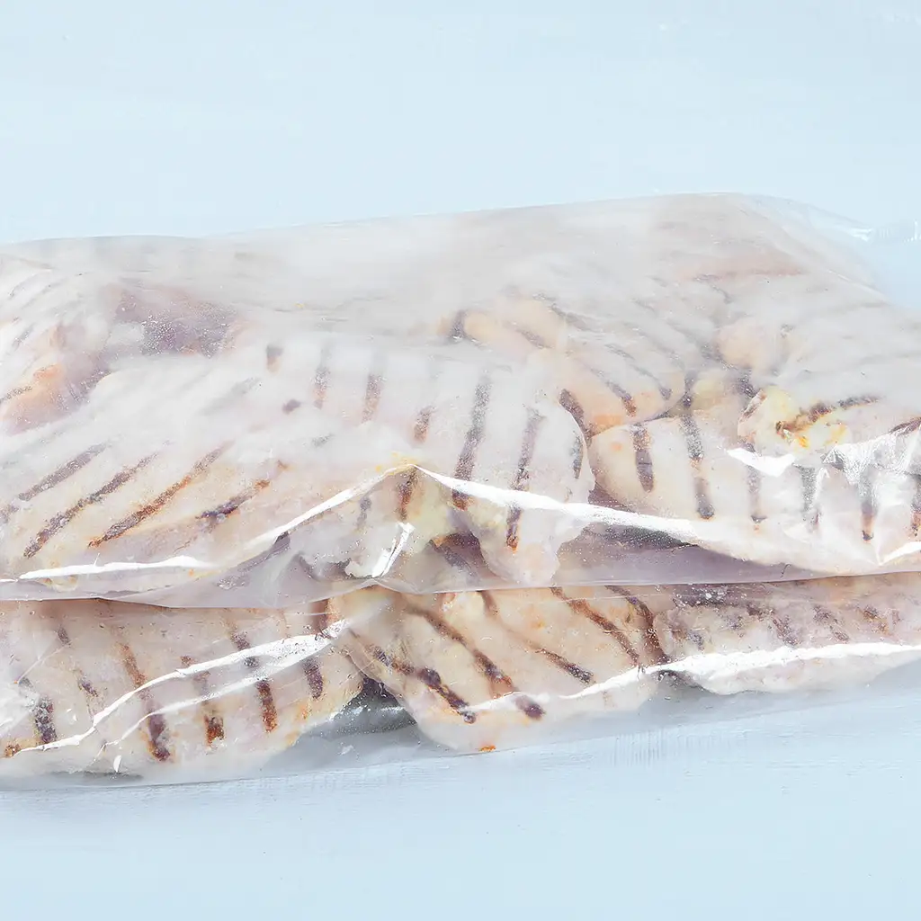 Poitrine de poulet désossées entièrement cuite congelé dans l'emballage