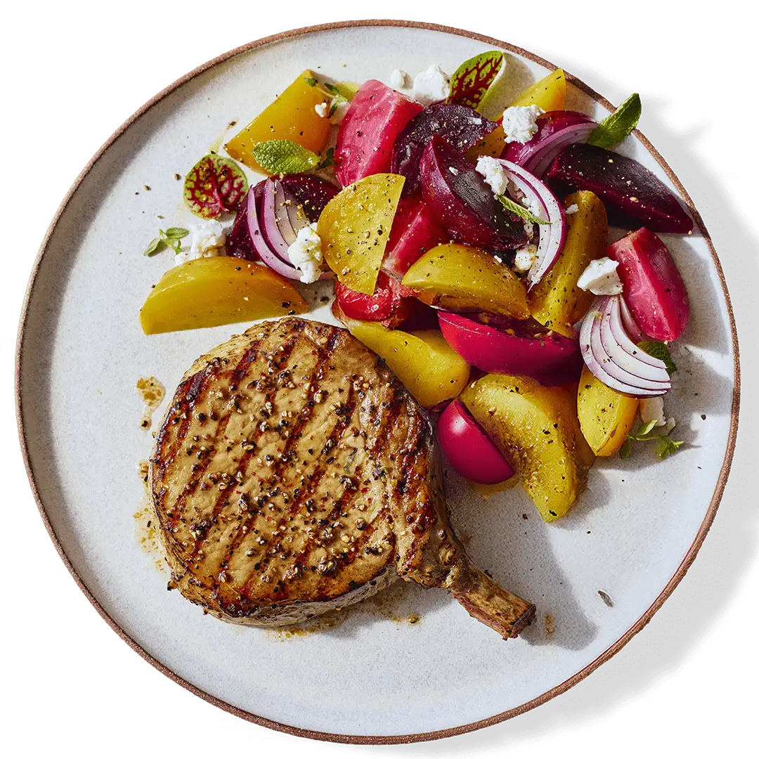 Repas de cotelette de porc avec légumes