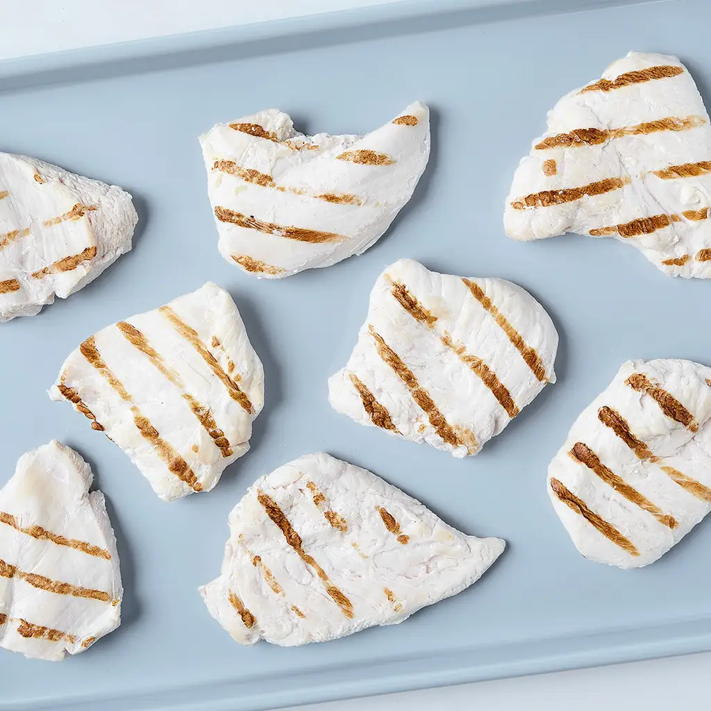 Poitrines de poulet désossées, entièrement cuites (assaisonnées)