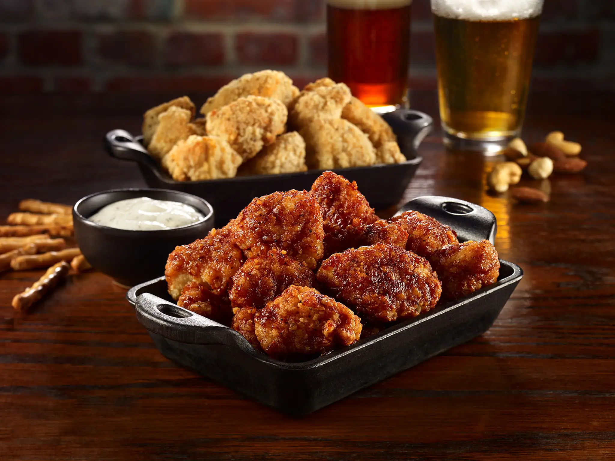 Bol de cubes de poulet, avec et sans sauce, de Pinty's