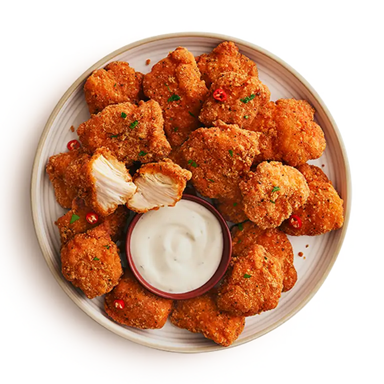 Assiette de morceaux de poulet buffalo sans gluten avec sauce ranch