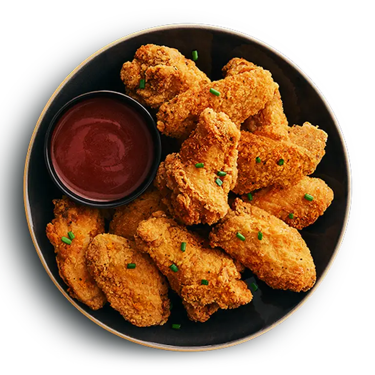 Assiette d'ailes de poulet croustillantes whisky tennessee bbq