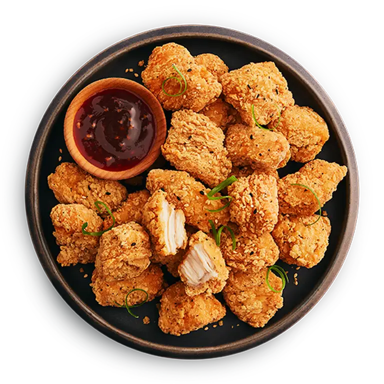 Assiette de morceaux de poulet à saveur miel et ail