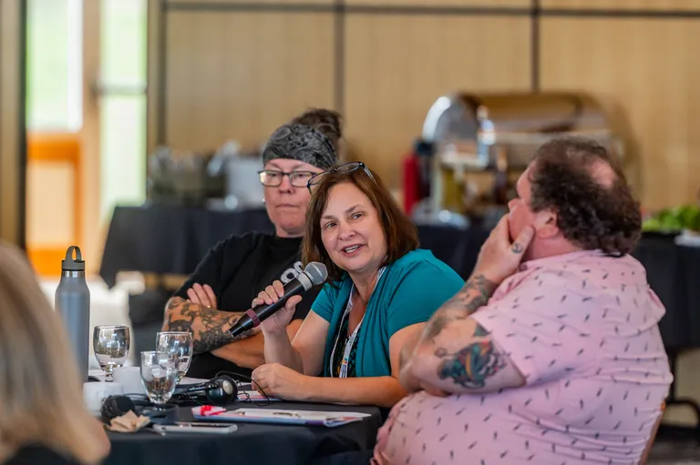 Dr. Kelli Stajduhar, one of the Improving Equity in Access to Palliative Care coaches, sharing reflections at a program workshop joined by team members representing Thunder Bay’s Palliative Advocacy and Care Team (PACT) and Victoria Cool Aid Society.