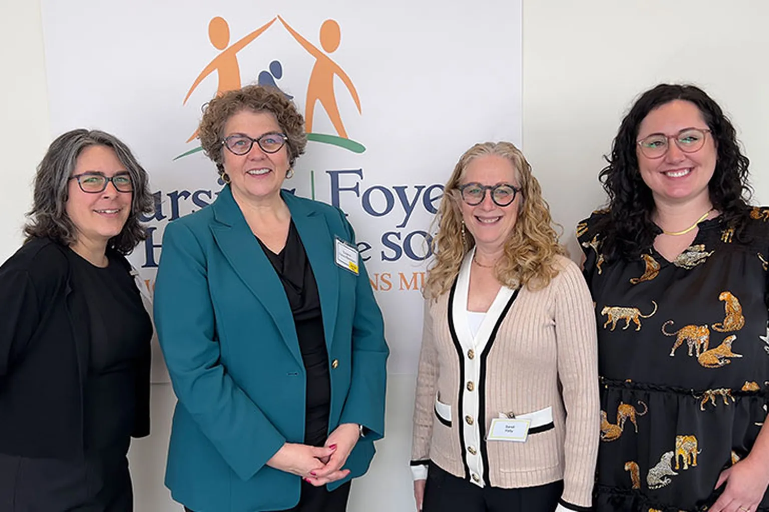 Dr. Suzanne Dupuis-Blanchard from Université de Moncton, Sandi Pelly from Waltons Trust, and Healthcare Excellence Canada team members pose for a photo to mark the expansion of the Nursing Home Without Walls program.